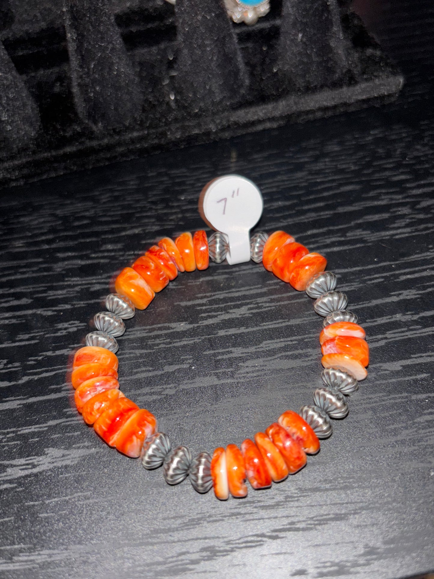 Bracelet with orange spiny oyster and sterling silver beads 