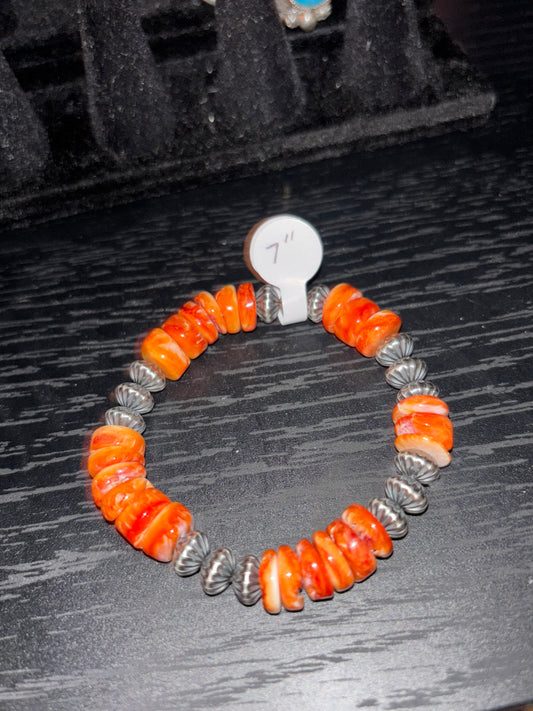 Bracelet with orange spiny oyster and sterling silver beads 