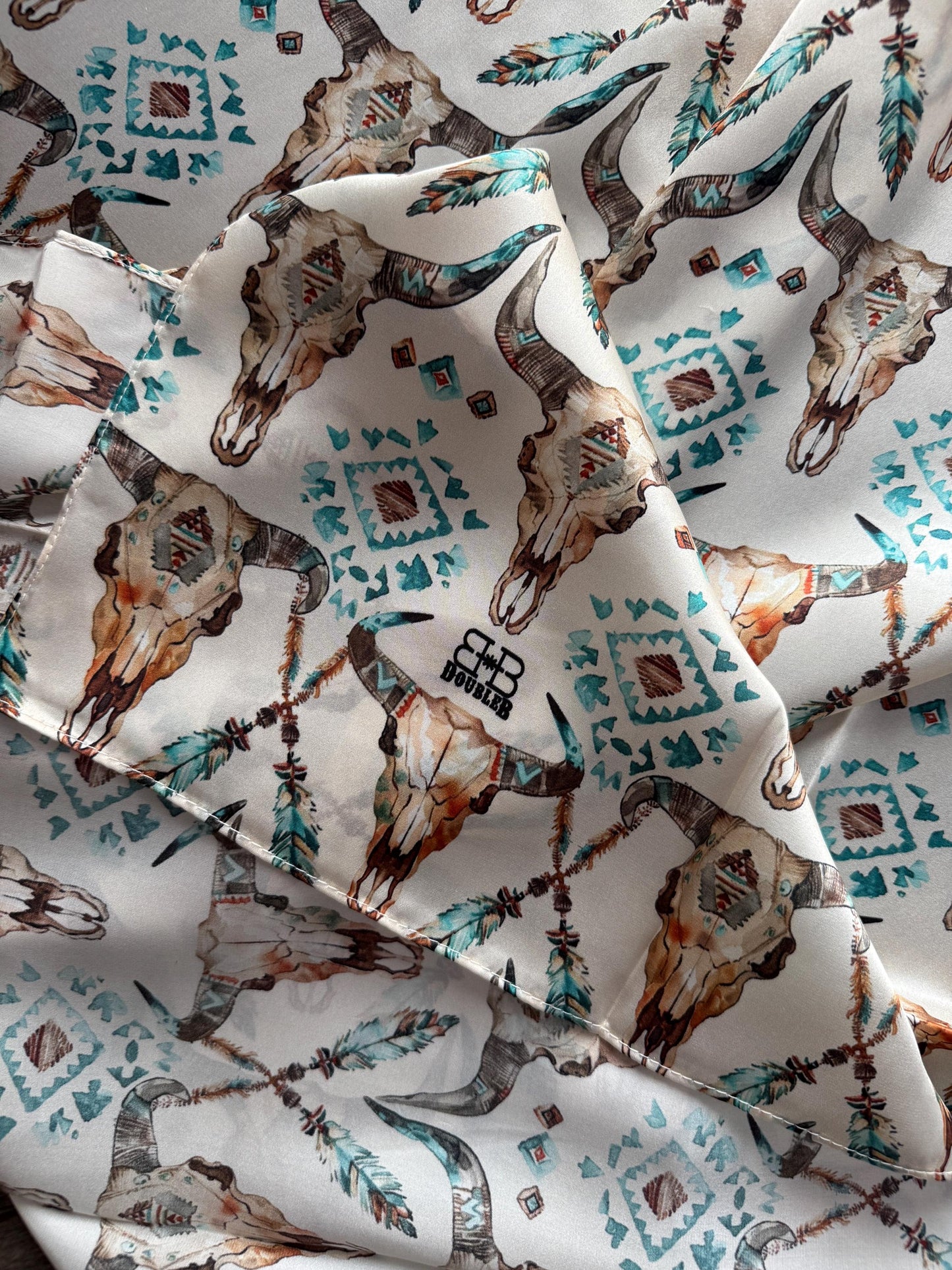 Fabric with bull skull and geometric pattern design on a white background